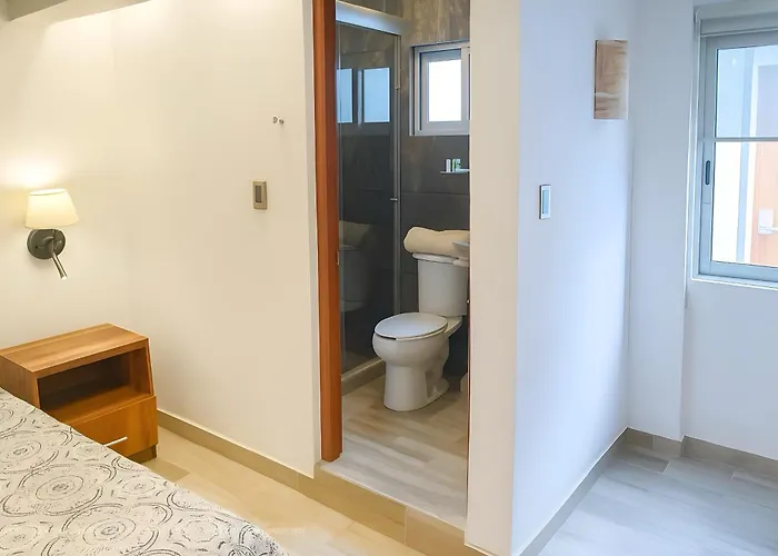 C O V A D O N G A Apartahotel