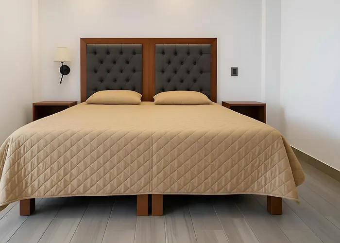 C O V A D O N G A Apartahotel